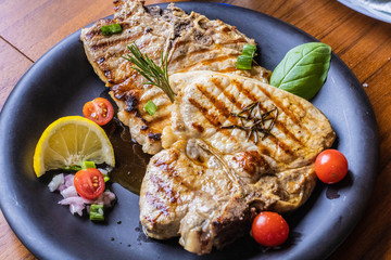 cooked beef steak on dish reaty to eat