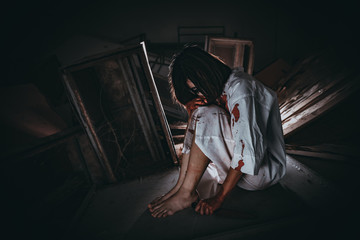 Fototapeta premium Portrait of asian woman make up ghost face,Horror scene,Scary background,Halloween poster