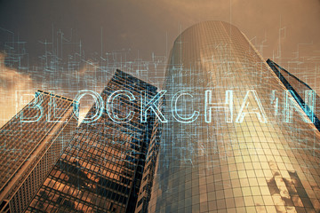 Double exposure of crypto currency theme hologram drawing and city veiw background. Concept of...