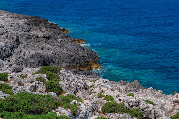 View over the rocky coast at the North Cape of Zakynthos, beautiful blue sea