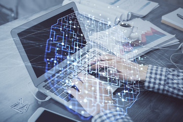 Double exposure of forex chart with man working on computer on background. Concept of market analysis.