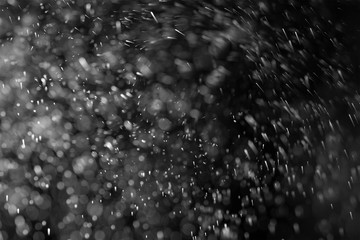 abstract splashes of water or snow on a dark background