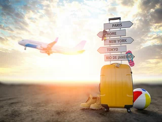 Fotobehang Yellow suitcase and signpost with travel destination, airplane.Tourism and  travel concept background. © Maksym Yemelyanov