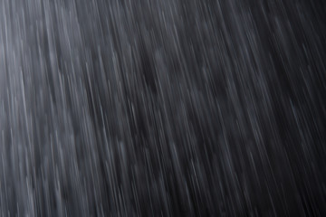 abstract spray of rain falling from above