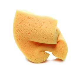 Crumpled yellow sponge for cleaning isolated on white background