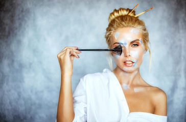 Obraz premium Creative fashion beauty portrait of beautiful young blonde woman with hairstyle.