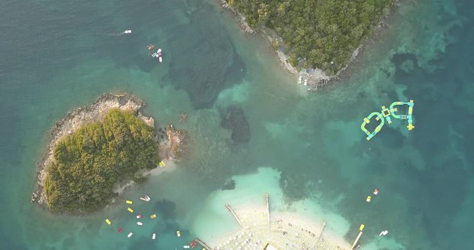 Beautiful seascape. Beach on coast of Ionian Sea in Albania, Ksamil, near Greece island Korfu. Birdseye view of Mirror Beach (Pasqyra) in Saranda, Albania (Albanian Riviera) View from drone