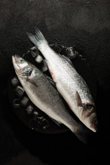 Fresh labrax on ice, raw sea fish. Protein and omega 3.