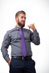 Bearded businessman imitates his phone calls