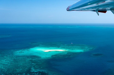 Obraz na płótnie Canvas View of tiny island from float plane near Dry Tortugas National Park in the Florida Keys