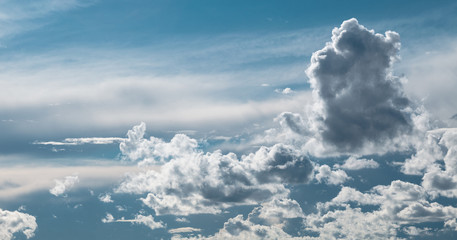 Fototapeta premium Dark thunderstorm and cirrus clouds in sky.