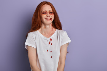 Obraz premium young girl suffers from painful wound, close up portrait, copy space.