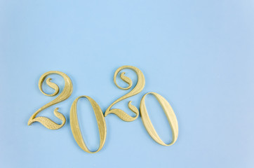 New Year 2020. Golden numbers on a blue background