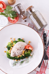 diet food. chicken breast with broccoli and chickpeas