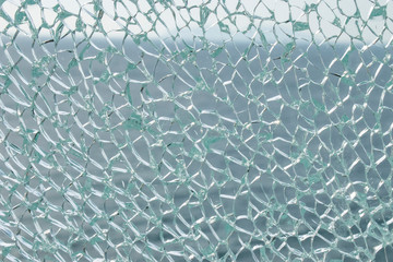 Broken glass with sea on background