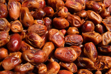 Delicious fresh organic dates as background