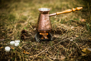Making coffee while camping on the stove