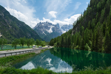 Fototapeta na wymiar Lago di Landro with reflections of the mountains in the water, Italy