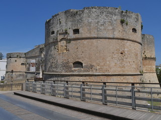 Fototapeta na wymiar Otranto Aragonese Castle. It was built with a pentagonal plan, surrounded by a high moat and with three cylindrical corner towers