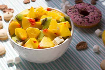 Fruit salad and sweets. Breakfast for the whole family