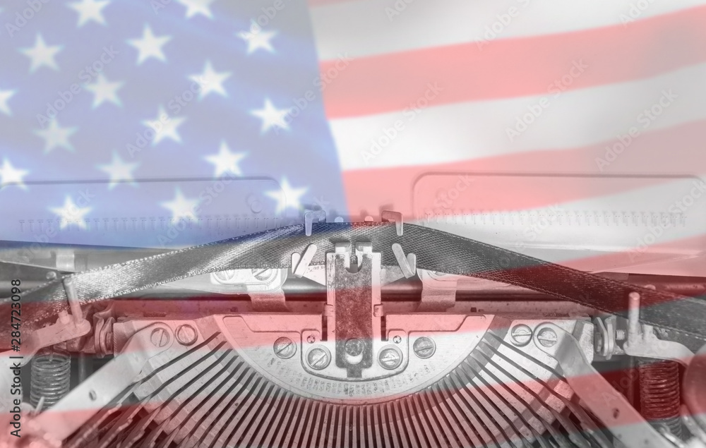 Fototapete old typewriter with blank paper, with america flag background. us. mock up blank page for mockups or