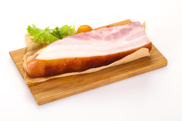 Smoked pork breast with salad leaves