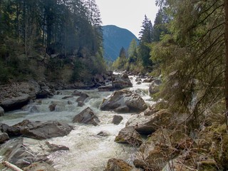 wild mountain creek with stones