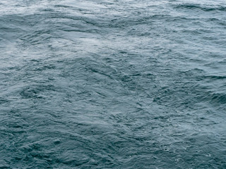 Sea water. Ripples on the sea.