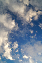 Large white cumulus clouds on a blue sky for background or ecology or nature.