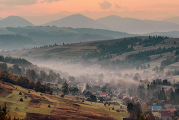 Colorful autumn landscape in the mountain village in Ukraine