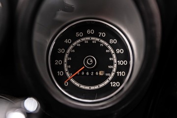 Old classic car speedometer and odometer