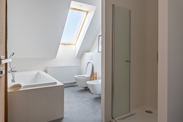 Modern bright apartment bathroom in the loft apartment