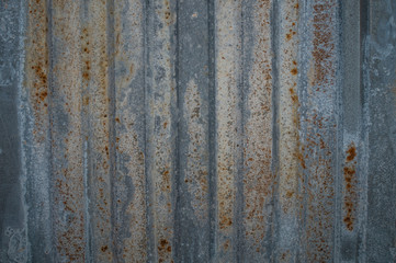 Rusty metal texture background. old iron ribbed wall texture