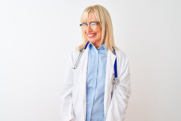 Middle age doctor woman wearing glasses and stethoscope over isolated white background winking...