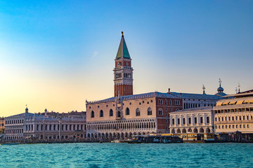 Fototapeta na wymiar The magnificent view of Venice at sunset in Italy. There are blue sky and clear water.