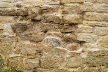 Rocky brick wall. stone wall background. abstract grunge texture. old brown masonry