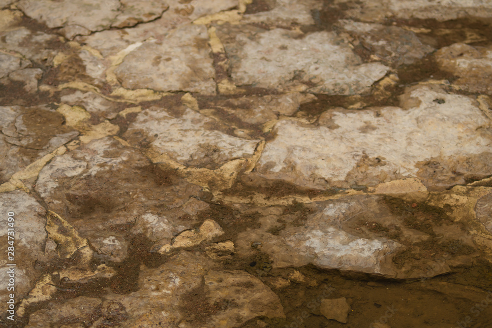 Wall mural Stone texture close up. rocky wall background. abstract grunge texture