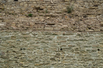 Rocky brick wall. stone wall background. abstract grunge texture. old brown masonry