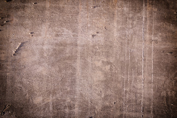 Dark brown abstract background. Closeup sheet texture of an old slate. Photo with vignette. The...
