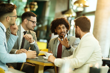 Business people enjoy and work in a cafe and drink coffee