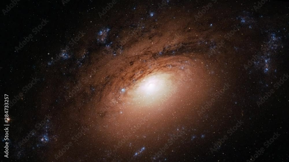 Wall mural spiral galaxy spectacular rotating animation in outer space. contains public domain elements by nasa