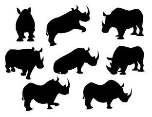 Black silhouette african rhinoceros in different poses cartoon animal design flat vector illustration isolated on white background