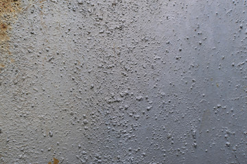 dirty silver-gray painted metal surface rusted from old age and stained as a background