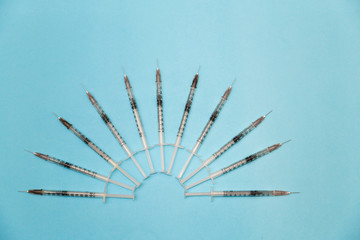 a pile of syringes for insulin. medical instrument, medical tool