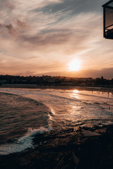 Warm sunset over Bondi Beach on a cold winter afternoon.