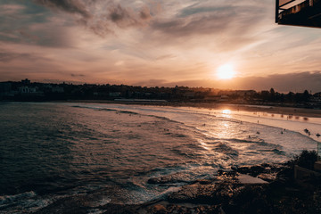Warm sunset over Bondi Beach on a cold winter afternoon.