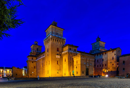 Castle Estense (Castello Estense) in Ferrara, Emilia-Romagna, Italy. Ferrara is capital of the Province of Ferrara. Night cityscape of Ferrara