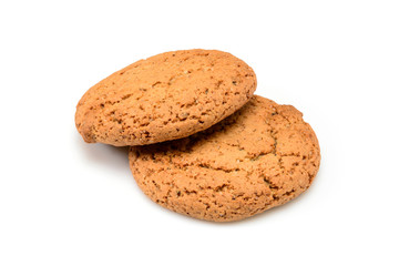 Homemade cookies. Two sweet cookie made from oatmeal flour. Tasty biscuit in high resolution closeup isolated on white background. Homemade bakery.