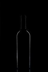 Wine bottle on a black background