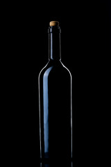 Wine bottle on a black background